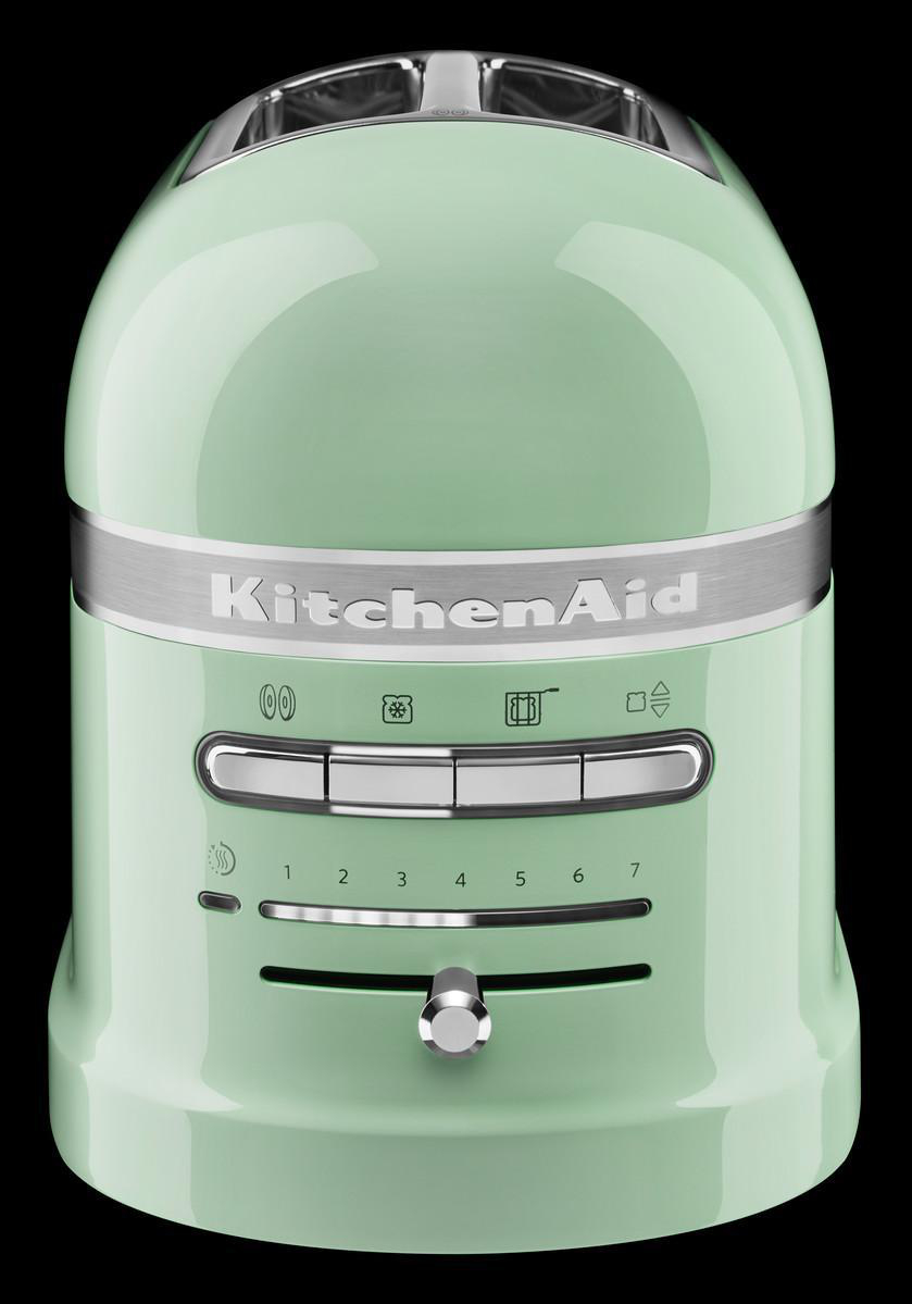Ein mintgrüner KitchenAid-Toaster mit Knöpfen und Einstellungen.