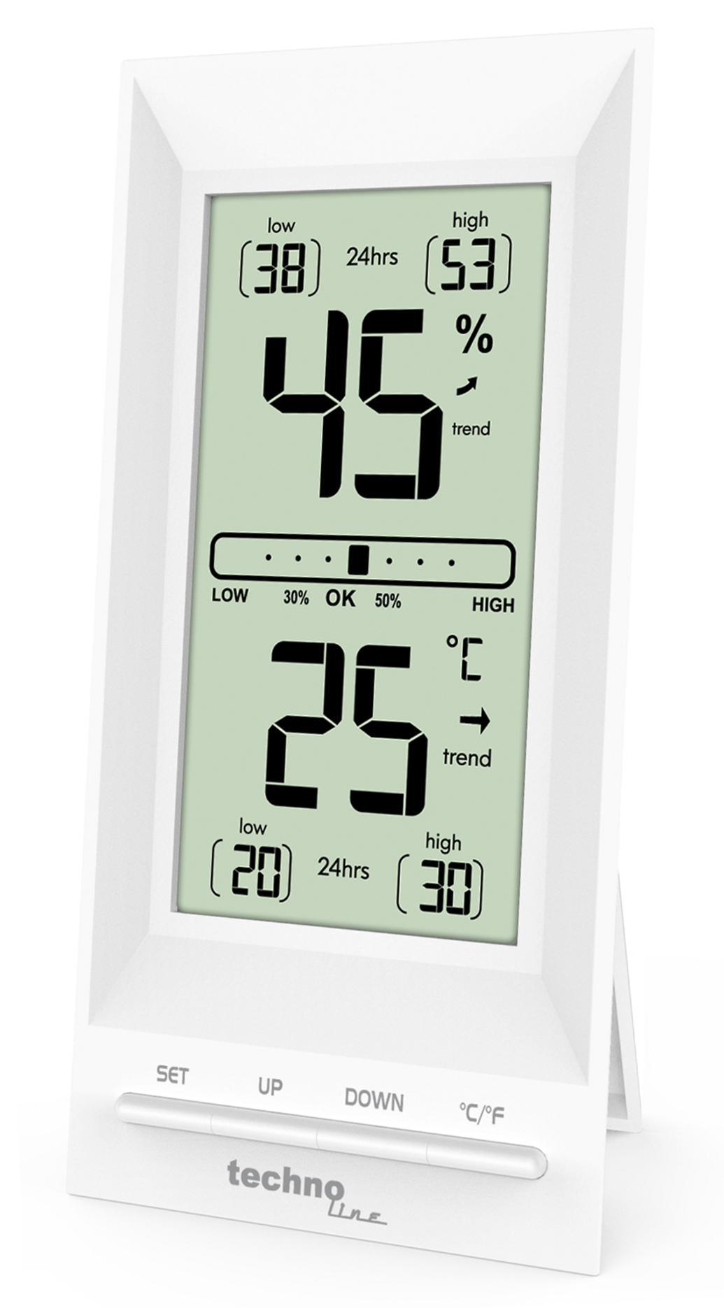 Weiße digitale Wetterstation zeigt Luftfeuchtigkeit, Temperatur und Trends an. Hat Knöpfe unten.