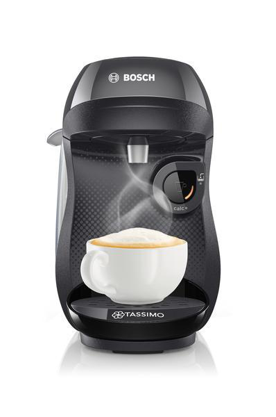 Eine schwarze Bosch Kaffeemaschine mit einer weißen Tasse Kaffee, Dampf sichtbar.
