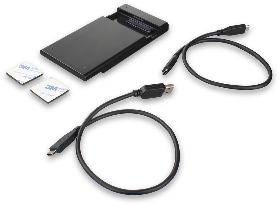 Boîtier de disque dur externe noir, câble USB et tampons adhésifs sur fond blanc.