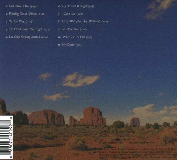 Albumcover, Wüstenlandschaft mit Bergen, Text mit Songtiteln.
