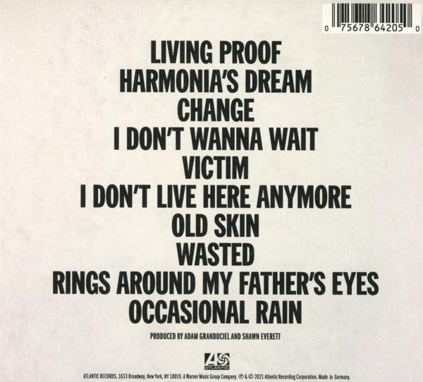 Pochette d'album avec une liste de titres de chansons. Le titre est "I Don't Live Here Anymore".