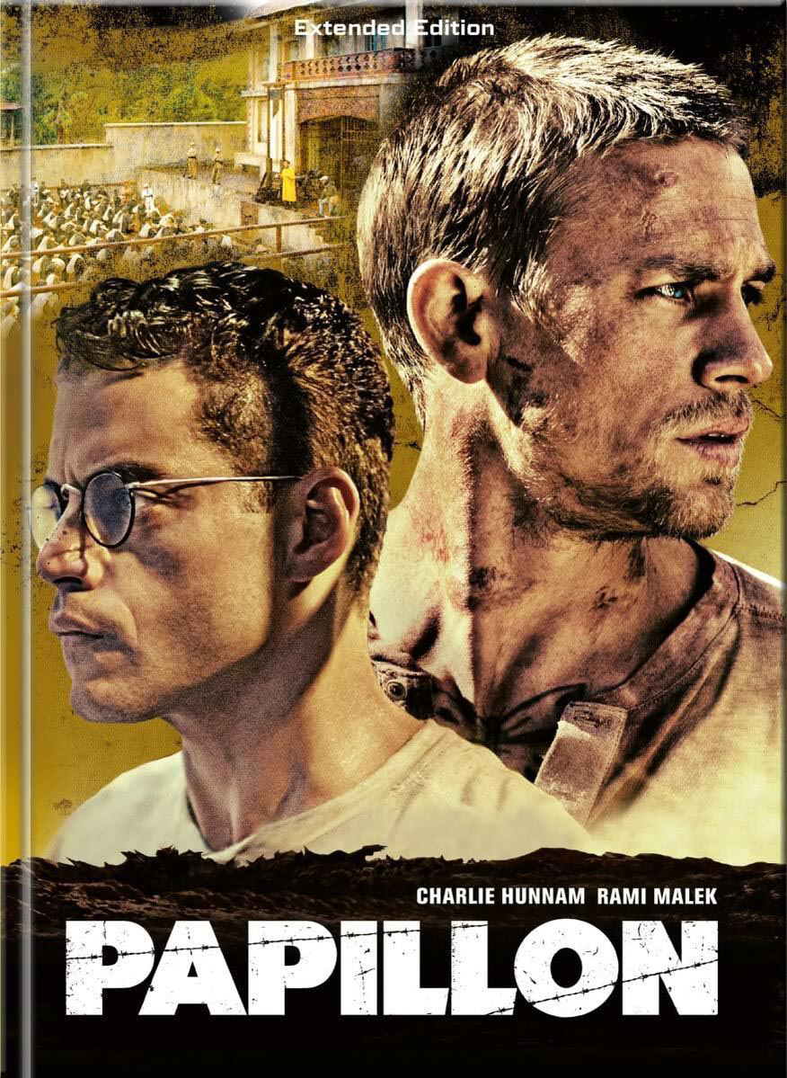 Filmposter von 'Papillon' zeigt zwei Männergesichter. Einer trägt eine Brille. Text 'Papillon' unten.