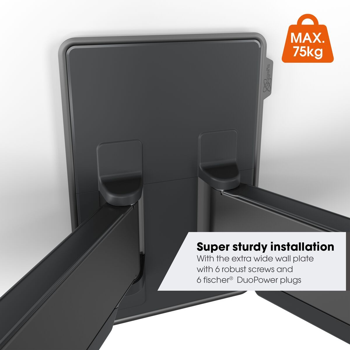 Supporto a parete nero con bracci estesi, testo bianco ed etichetta Max 75kg, su un muro bianco.