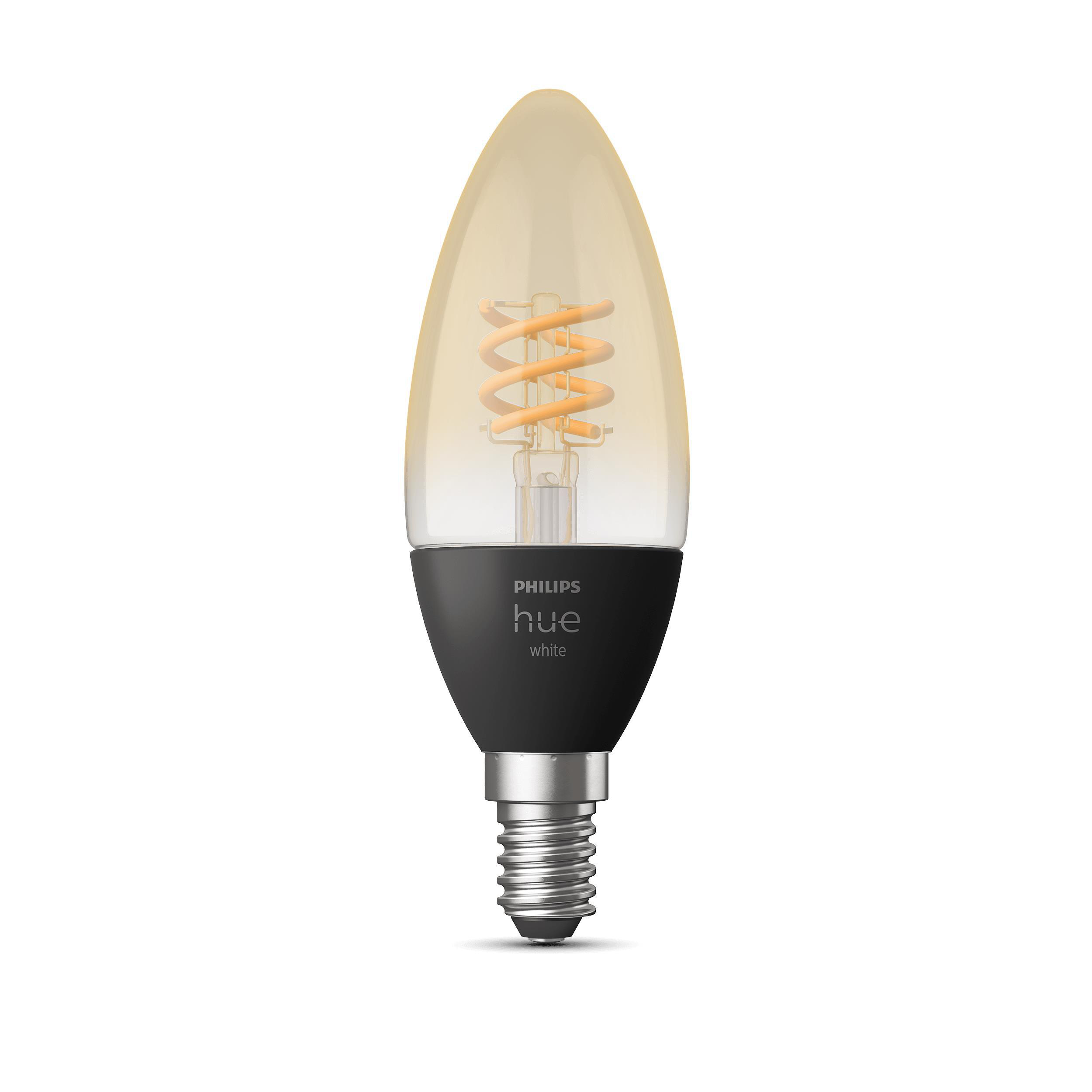Eine weiße und schwarze Philips Hue Glühbirne. Es hat einen gewirbelten Glühfaden und einen schwarzen Sockel.