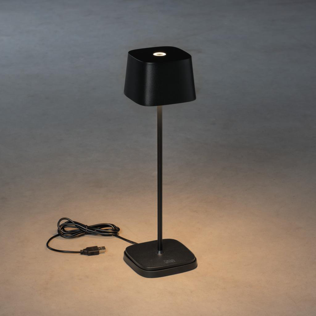 Schwarze moderne Lampe mit quadratischem Sockel und Schirm, mit Kabel.