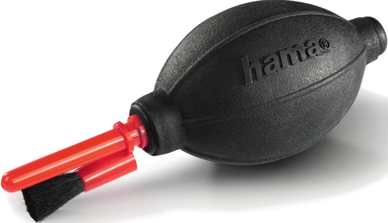 Une poire soufflante en caoutchouc noir avec une brosse rouge attachée.