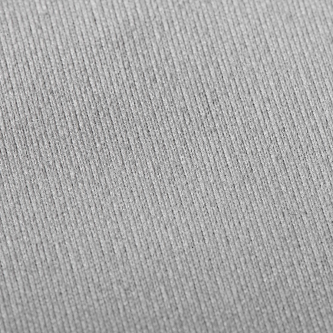 Gros plan d'un tissu gris. Le tissu a une surface texturée avec des lignes diagonales.