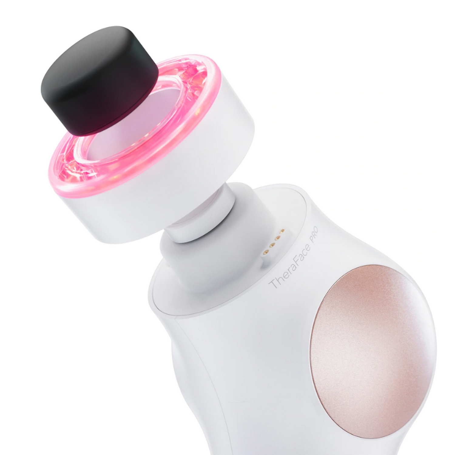 Un dispositivo TheraFace Pro blanco y oro rosa con cabezal desmontable.