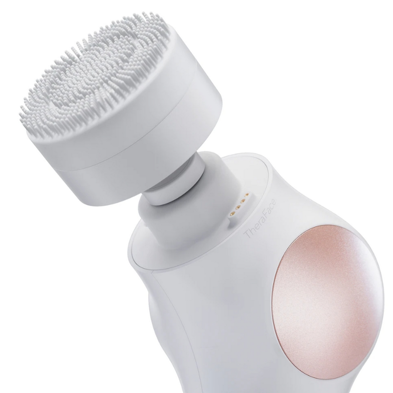 Un cepillo de limpieza facial blanco con cabezal giratorio.