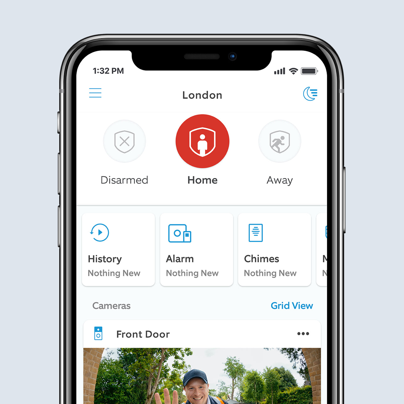 Smartphone app interface showing security status as 'Home'. Displays options for history, alarm, and chimes. A live camera feed is visible.