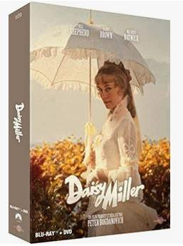 DVD box art of 'Daisy Miller'. A woman with parasol stands in front of yellow flowers.