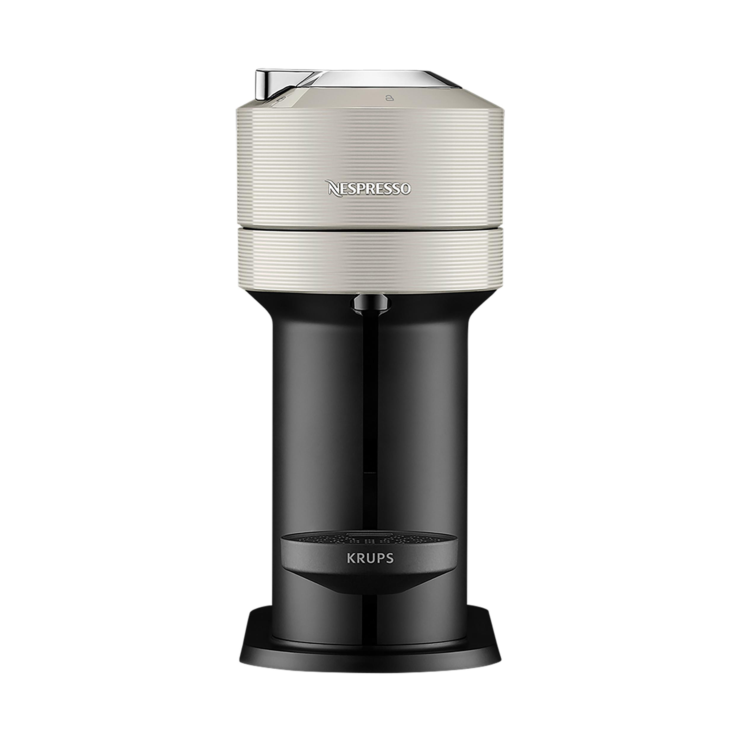 Eine Nespresso-Kaffeemaschine, cremefarben und schwarz.