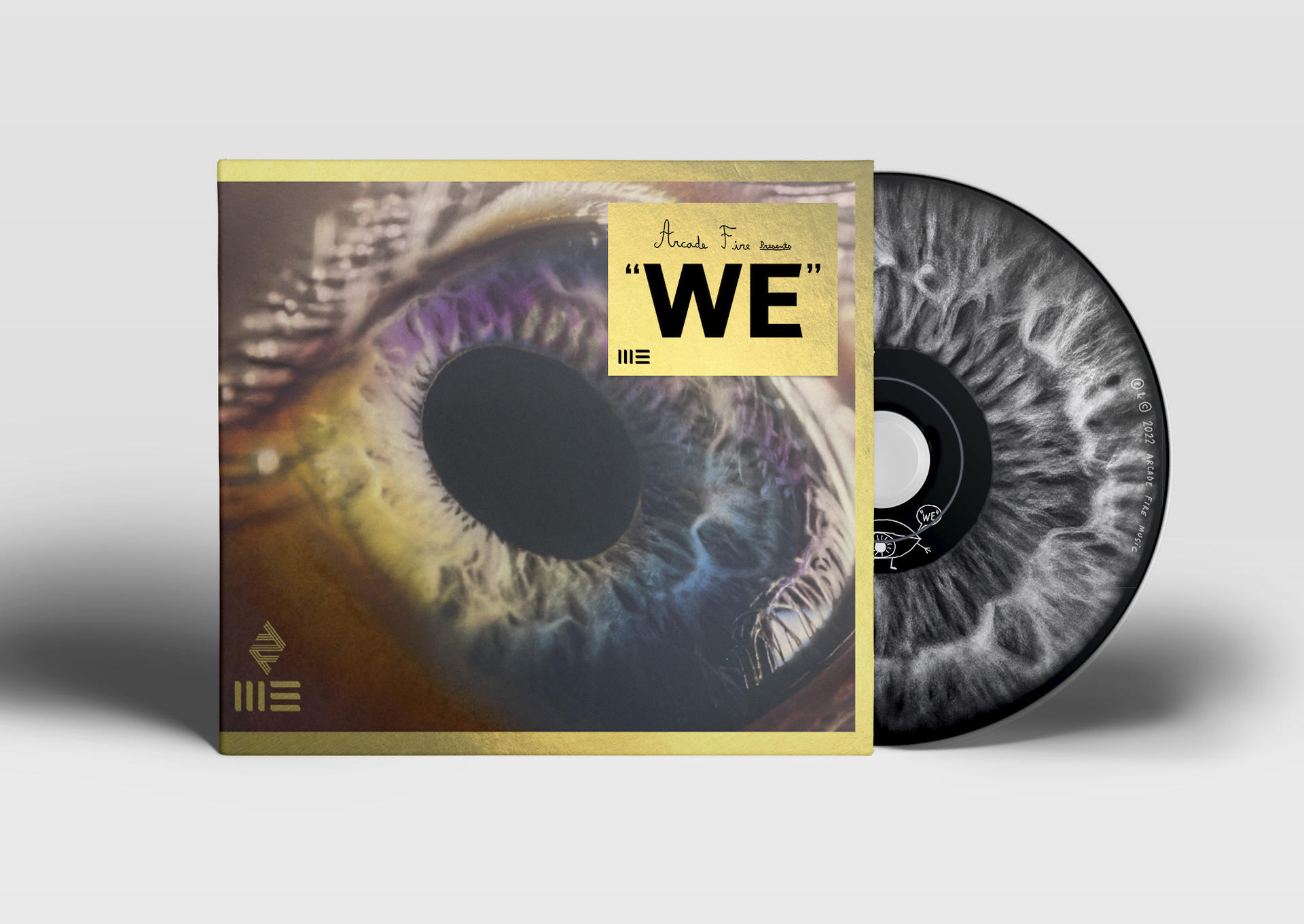 Eine CD und ihr Albumcover mit einem Augenbild.