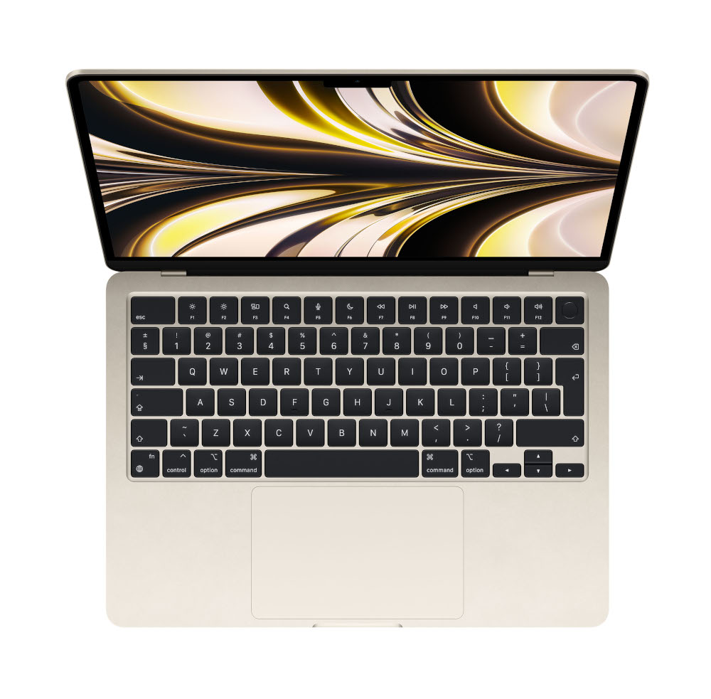 Un ordinateur portable, vue de dessus, avec l'écran ouvert, montrant le clavier et le pavé tactile.