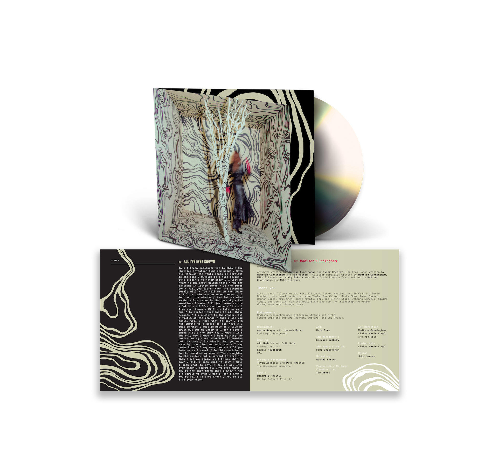 CD-Cover mit abstrakter Kunst und einer Person. Eine CD befindet sich daneben. Weitere Details sind unten.