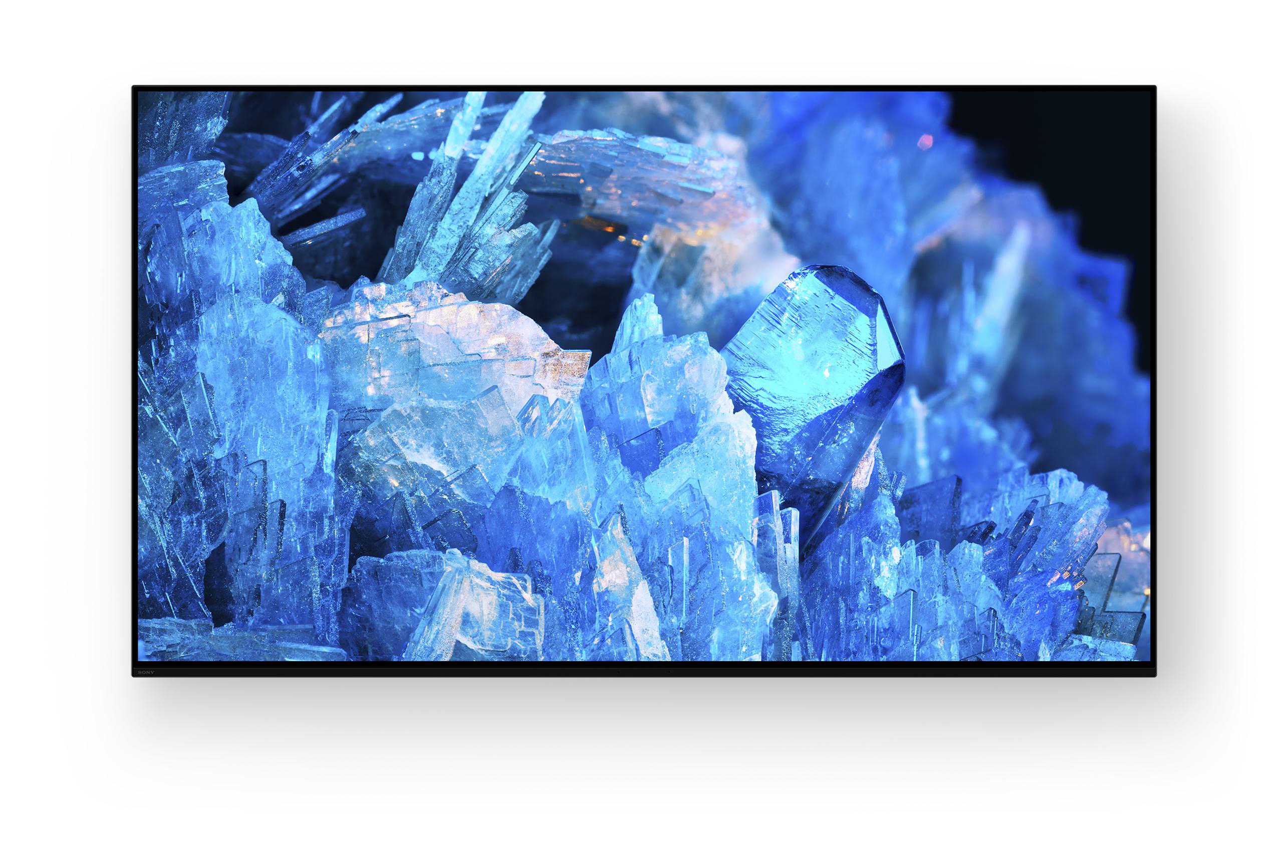 Nahaufnahme eines modernen Fernsehbildschirms mit blauem, kristallähnlichem Bild.