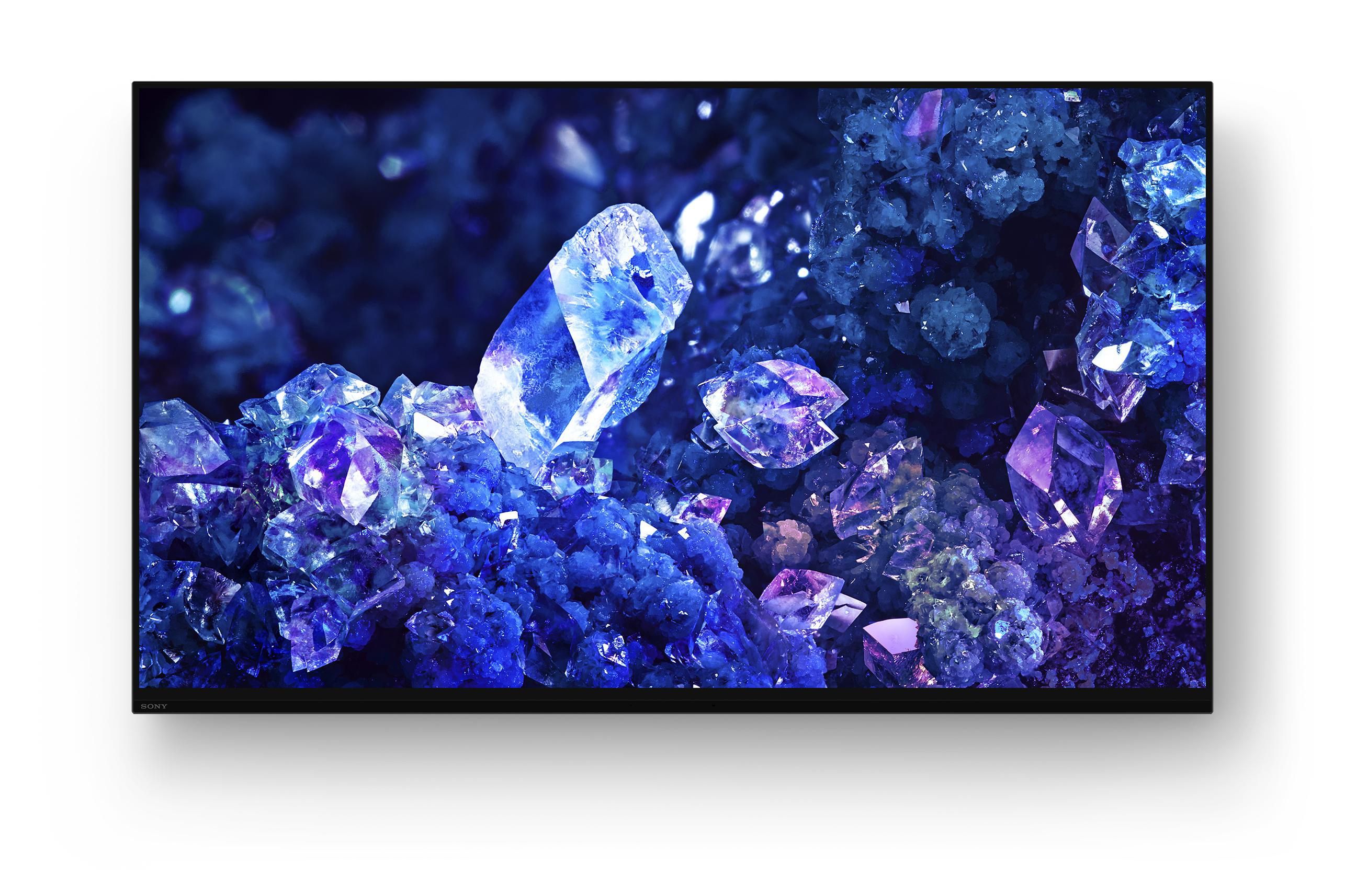 Ein Fernseher mit blauen Kristallen und schwarzem Rahmen.