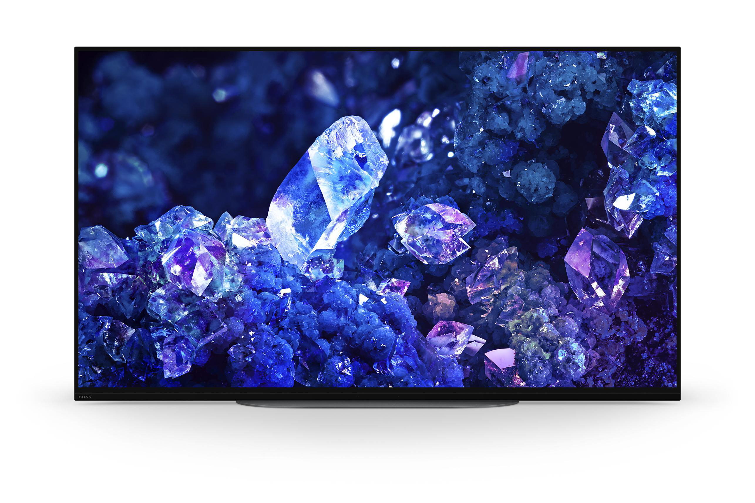 Großer Fernsehbildschirm mit einer lebendigen Darstellung von blauen und violetten Kristallen.