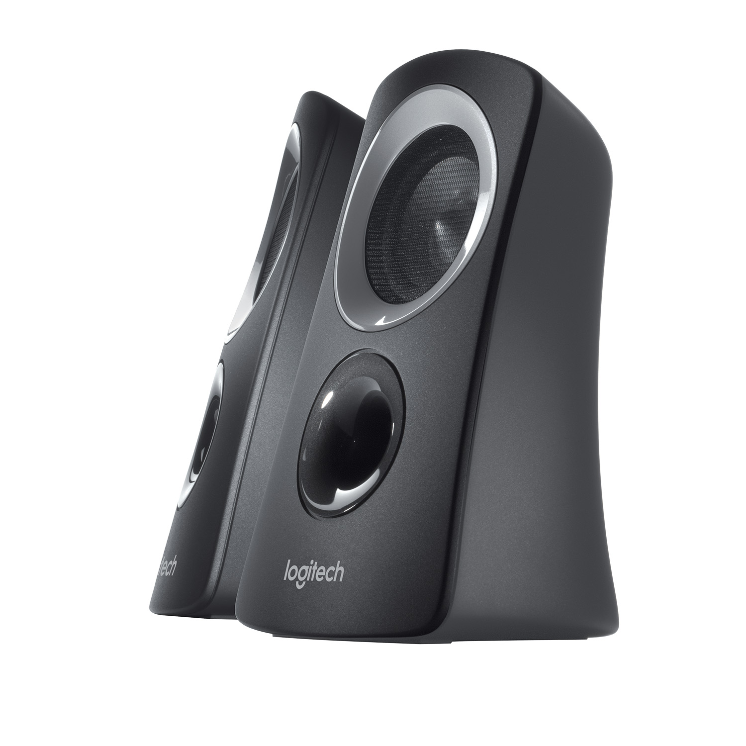 Dos altavoces Logitech negros. Anillos plateados alrededor de los altavoces. Fondo blanco.
