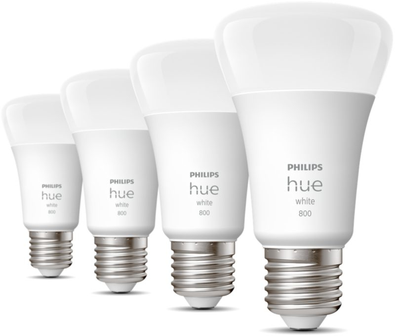 Four Philips Hue white light bulbs in a row, white bulbs with silver bases, on a white background.