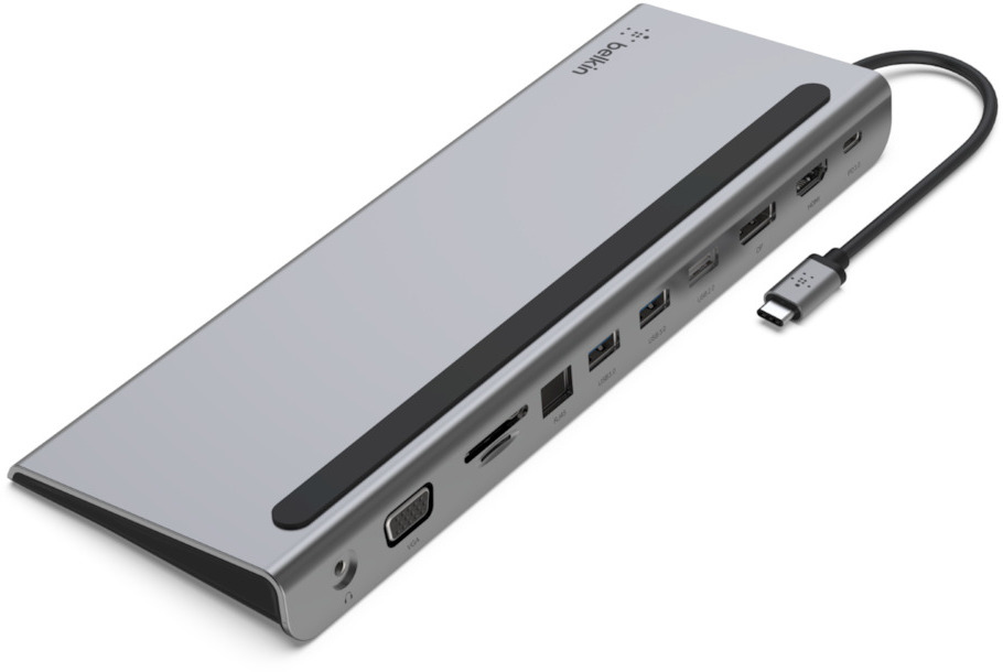 A silver docking station with multiple ports, black cable, and white background.