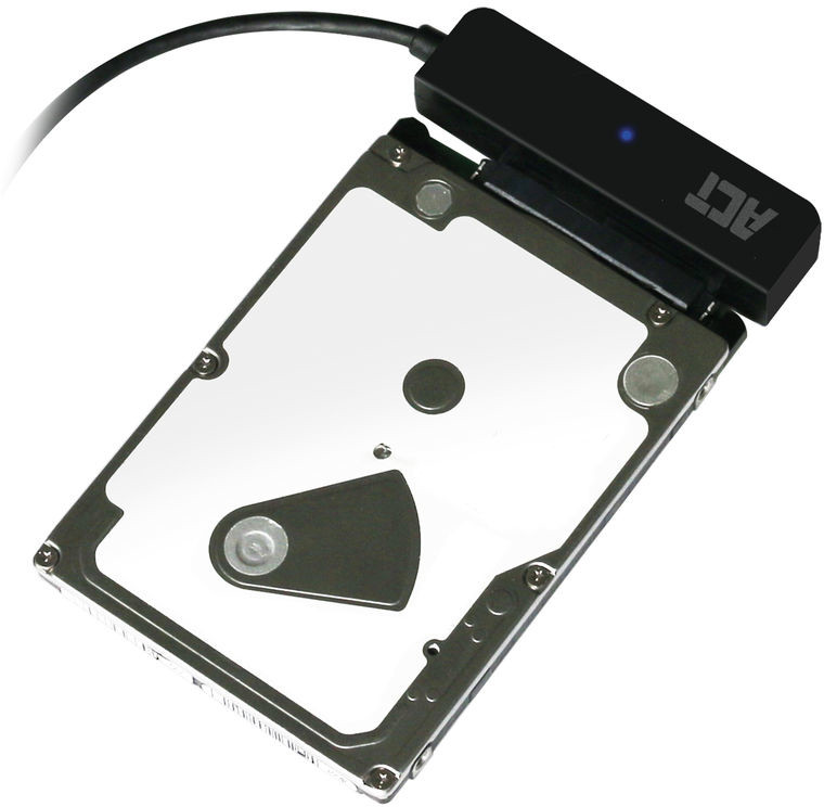 A silver hard drive with a black ACT adapter.
