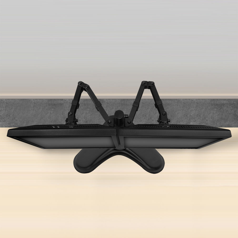 Two monitors mounted on a desk with a black stand. The view is from above.
