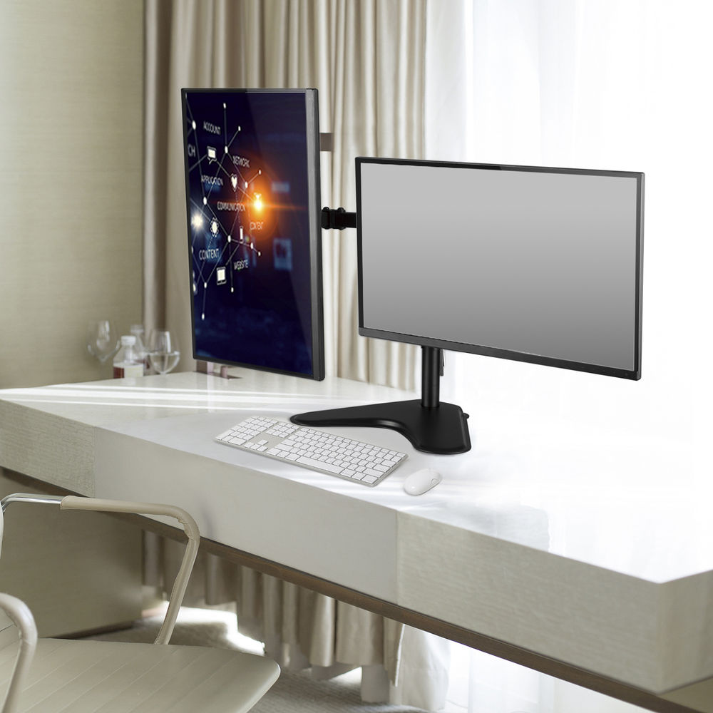 Two computer monitors side by side on a white desk with keyboard and mouse.