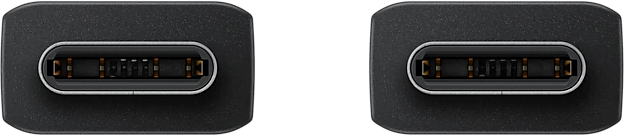 Gros plan sur deux ports USB-C. Connecteurs noirs avec broches internes visibles. Fond noir.