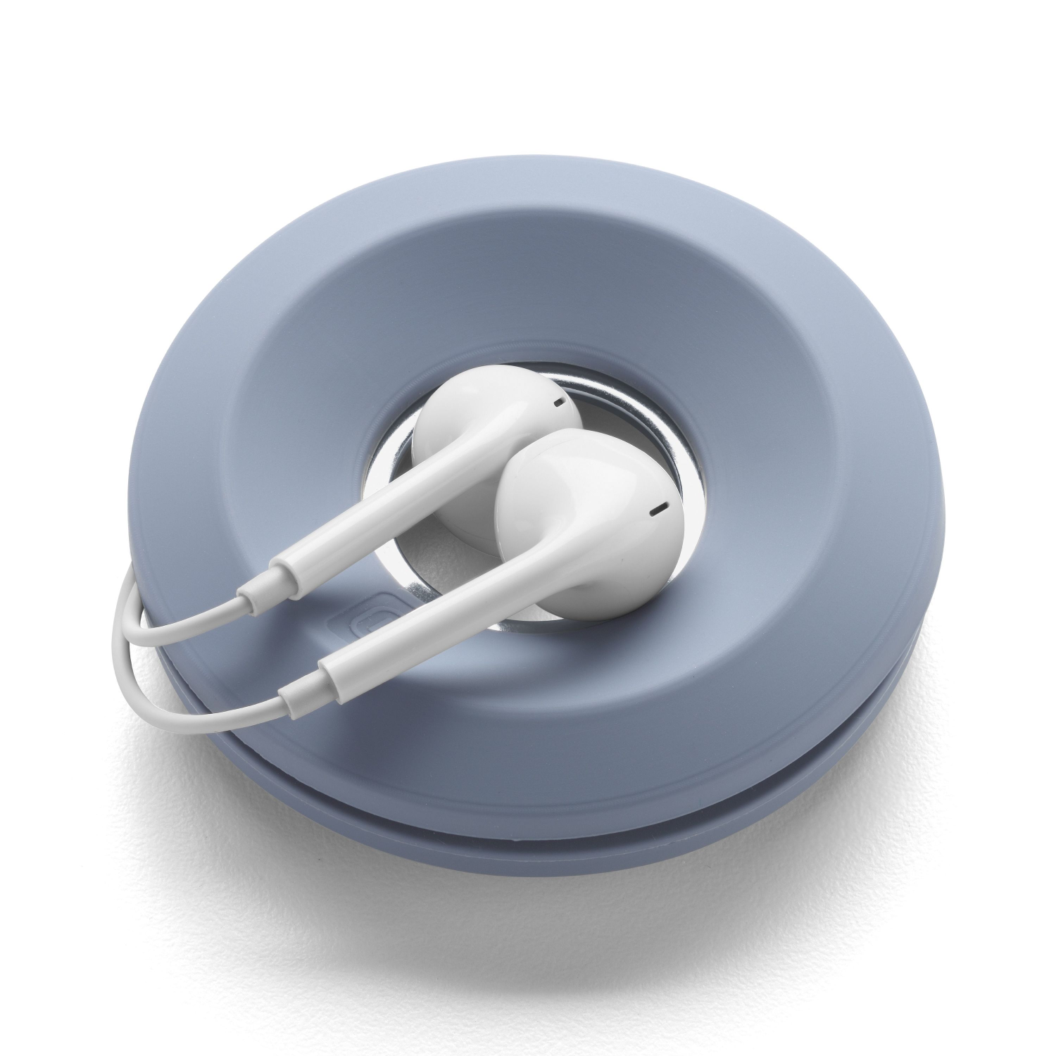 Pair of white earbuds inside a blue circular case. The case has a silver center.