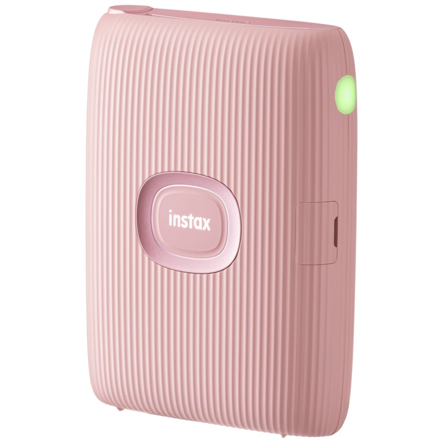 A pink Instax camera. It has a lens, a button, and a slot. The surface has vertical lines.