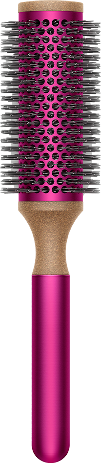 Pink and gold hair brush, cylindrical shape with bristles. Handle is pink.
