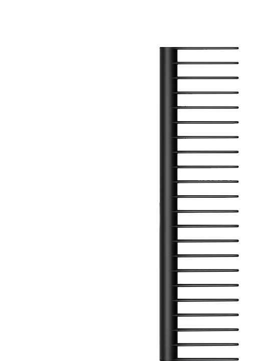 A ruler with black divisions and markings. Vertical and against a black background.