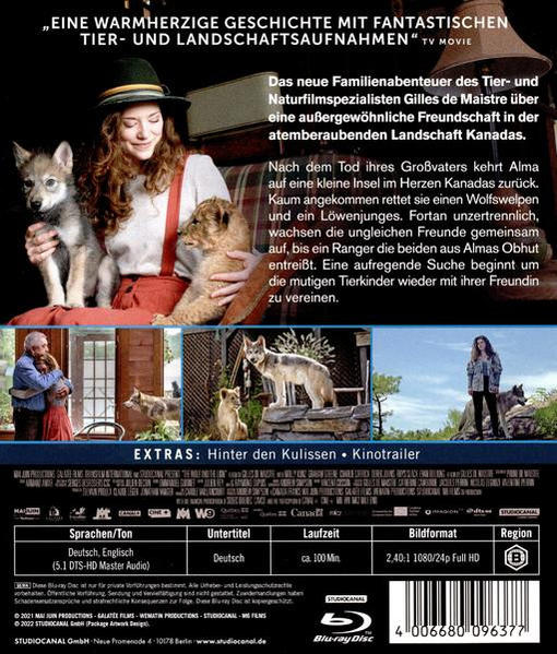 Filmposter mit einer Frau, Welpen und Text. Ein Film über Wölfe in Kanada.