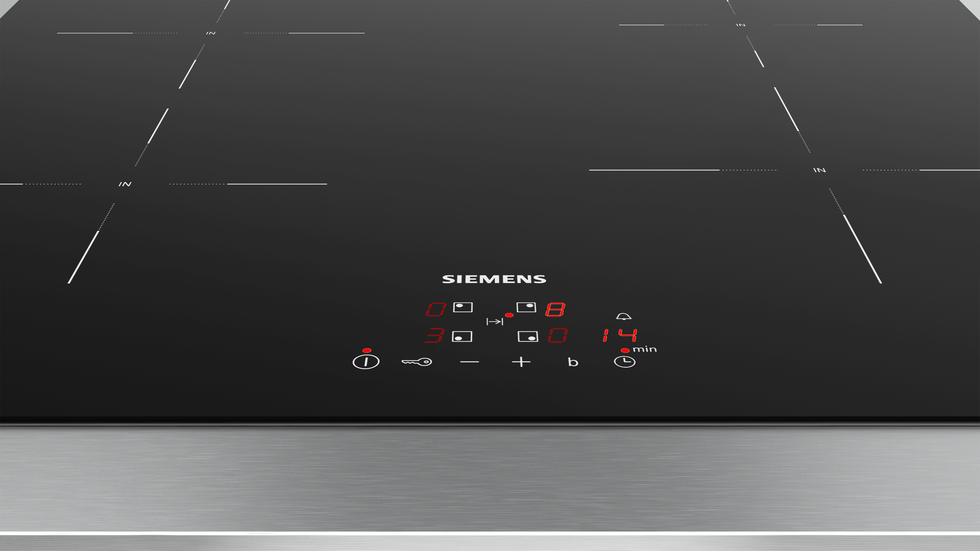 Black induction cooktop. Displays cooking zones and digital controls.  Modern, sleek design.