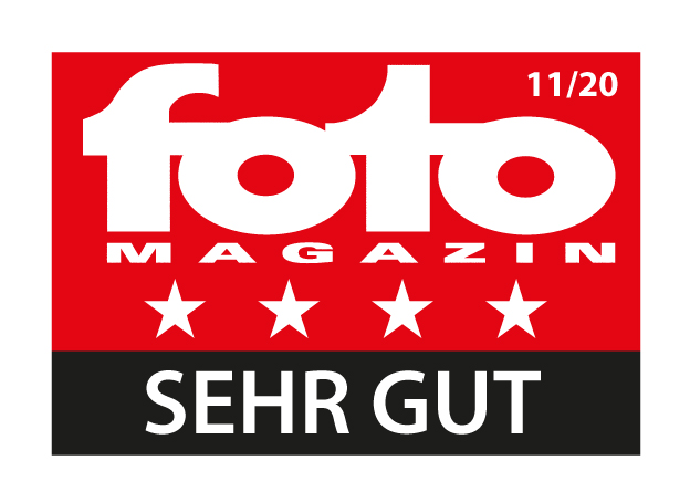 Une couverture de magazine avec le texte 'foto magazin' et quatre étoiles avec le texte 'SEHR GUT'.