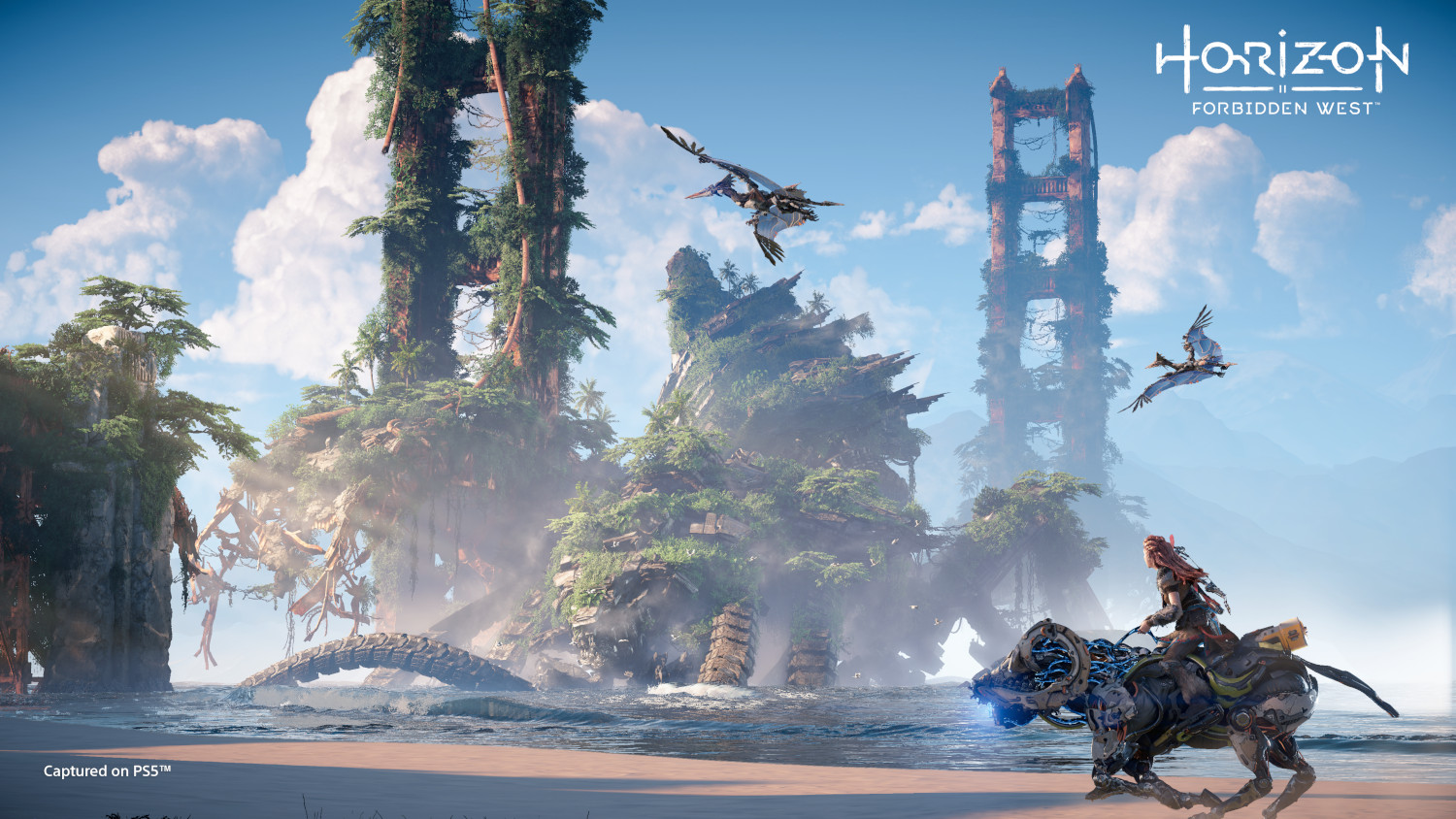 Woman rides robotic beast on beach near lush ruins and flying creatures.