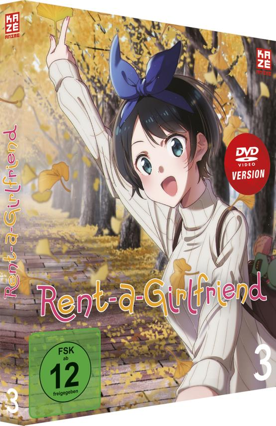 Anime-DVD-Hülle, Rent-a-Girlfriend. Ein Mädchen zeigt nach oben, mit gelben Blättern. Der DVD-Umschlag.