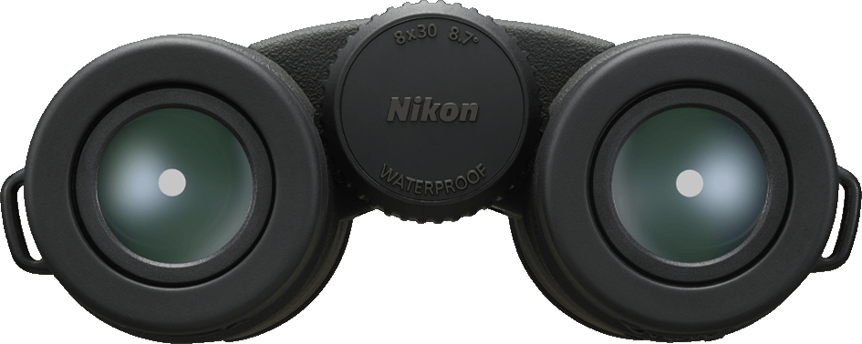 Primo piano di binocolo nero con marchio Nikon. Le lenti sono verdi con un puntino bianco.