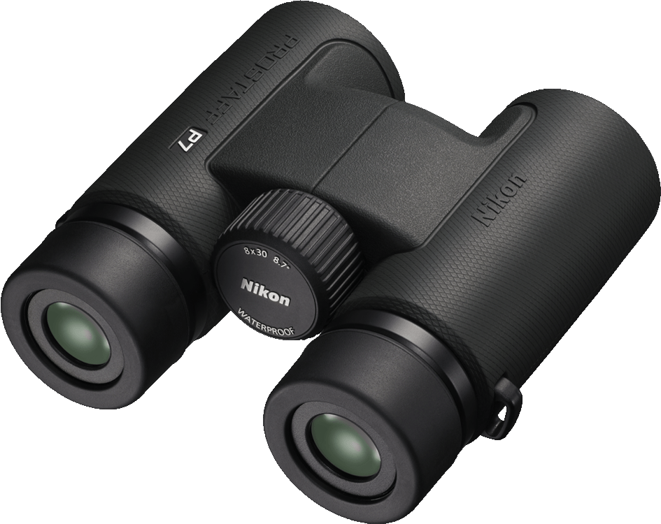 Jumelles Nikon noires avec un fond noir. Le modèle est Prostaff P7.