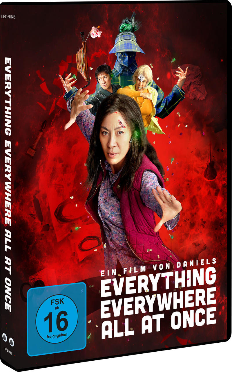 Film-DVD-Cover. Frau im Zentrum. Schauspieler hinter ihr, mit rotem und schwarzem Hintergrund.