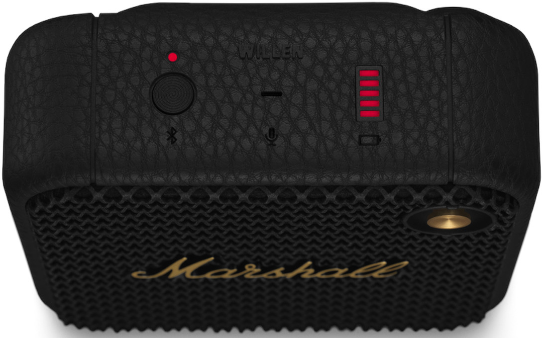 Een zwarte Marshall-luidspreker met knoppen en een gouden Marshall-logo.