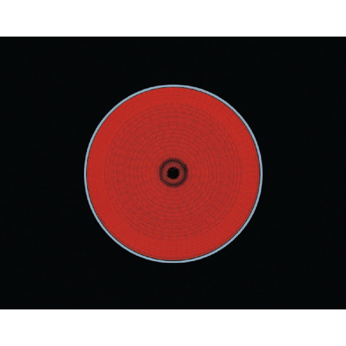 Elemento de cocción circular rojo sobre fondo negro.