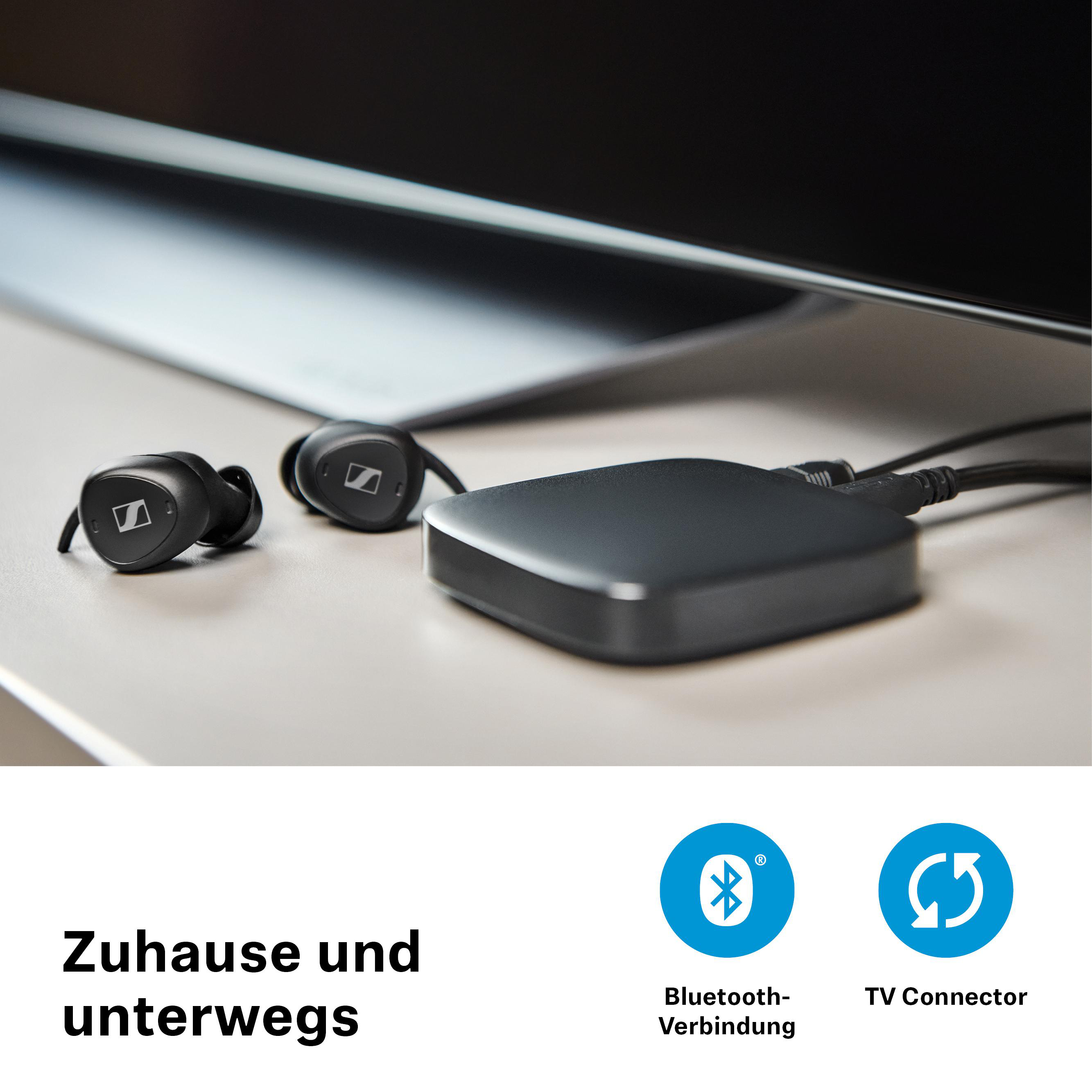 Schwarze Ohrhörer, eine schwarze Box, Bluetooth- und TV-Symbole.