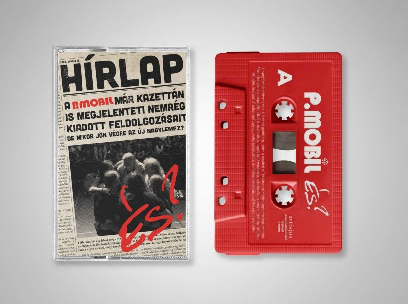 Egy kazettás magnószalag és egy újságkivágás. A szalag piros, a papír régi.