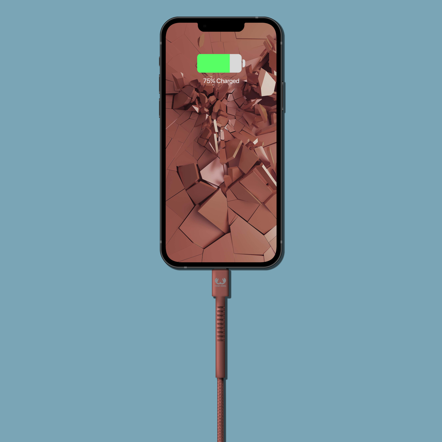 Phone charging to 75% with a red cable on a blue background.