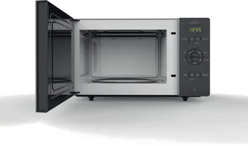 A microwave oven with the door open, showing the interior. The time 12:35 is displayed.