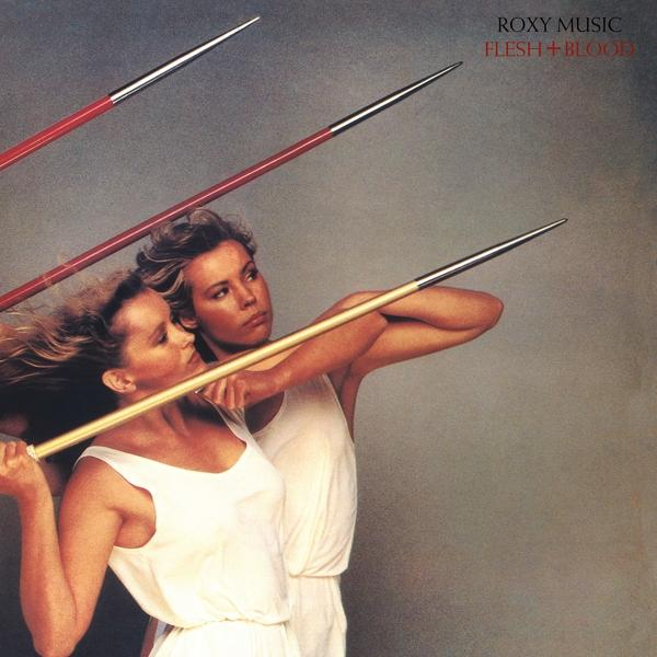 A Roxy Music 'Flesh + Blood' című albumjának borítója. Két nő lándzsát tart szürke háttér előtt.