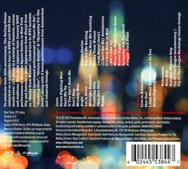 Dos d'un album des Rolling Stones avec titres, texte, image colorée.